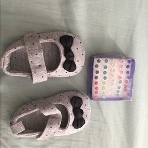 Earrings and baby shoes